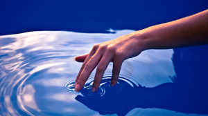 Hand Touching Water HD